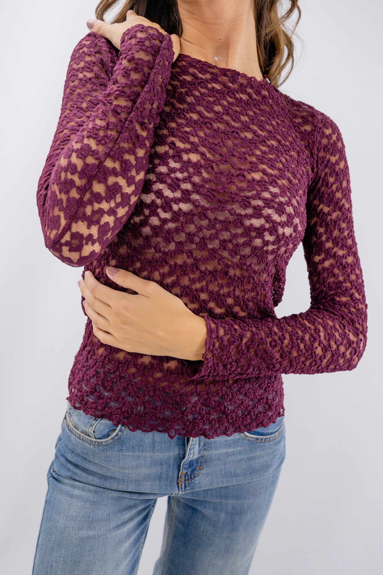 Maglia in pizzo a maniche lunghe