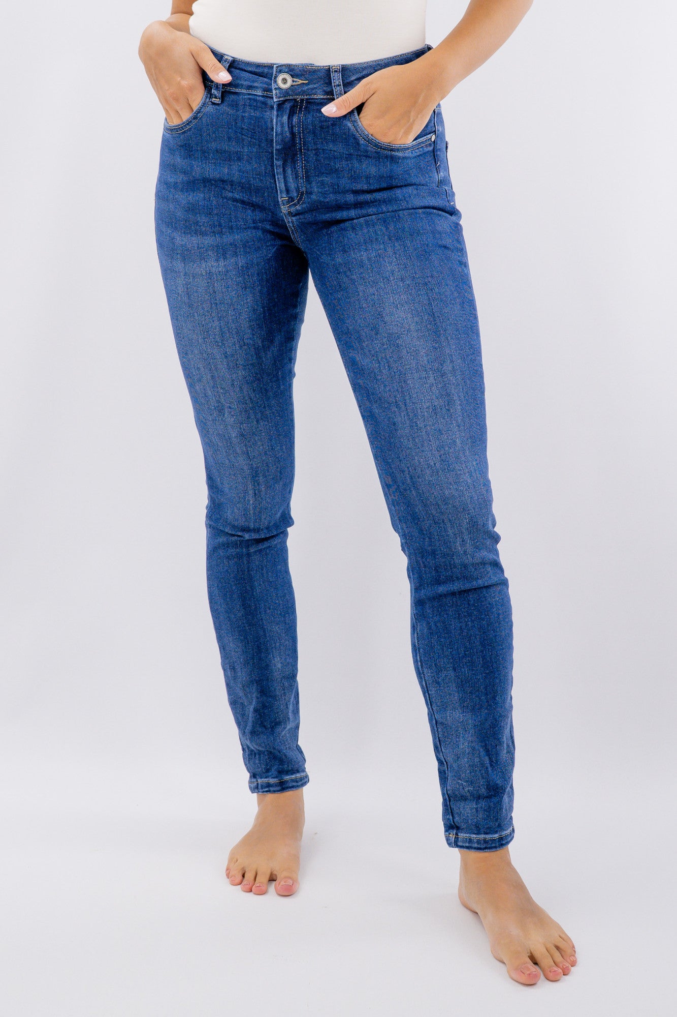 Jeans skinny a vita regolare con comfort stretch
