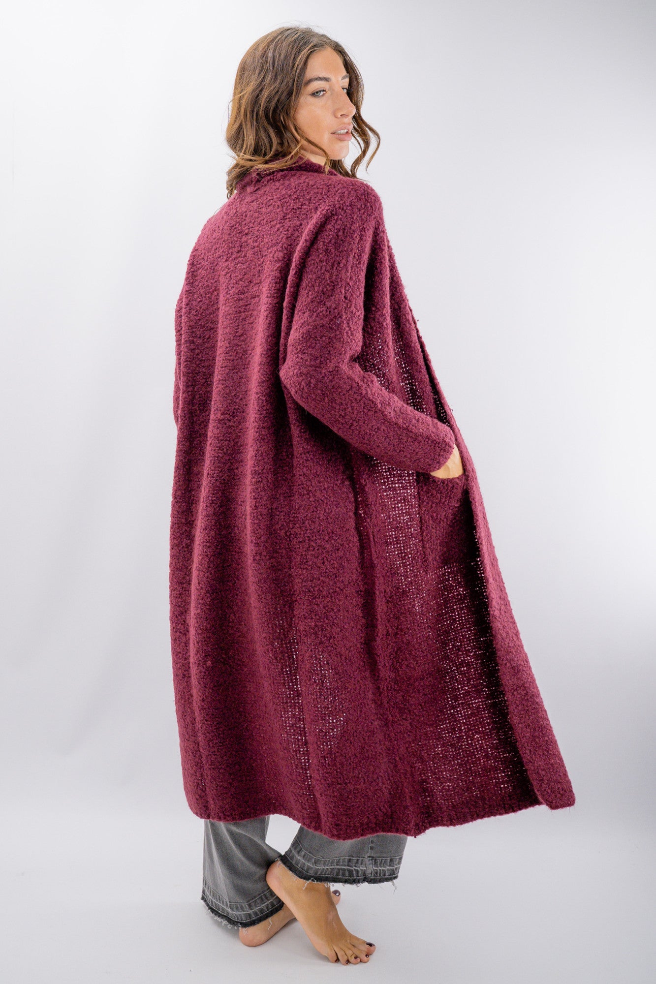 Cardigan lungo bouclé con tasche
