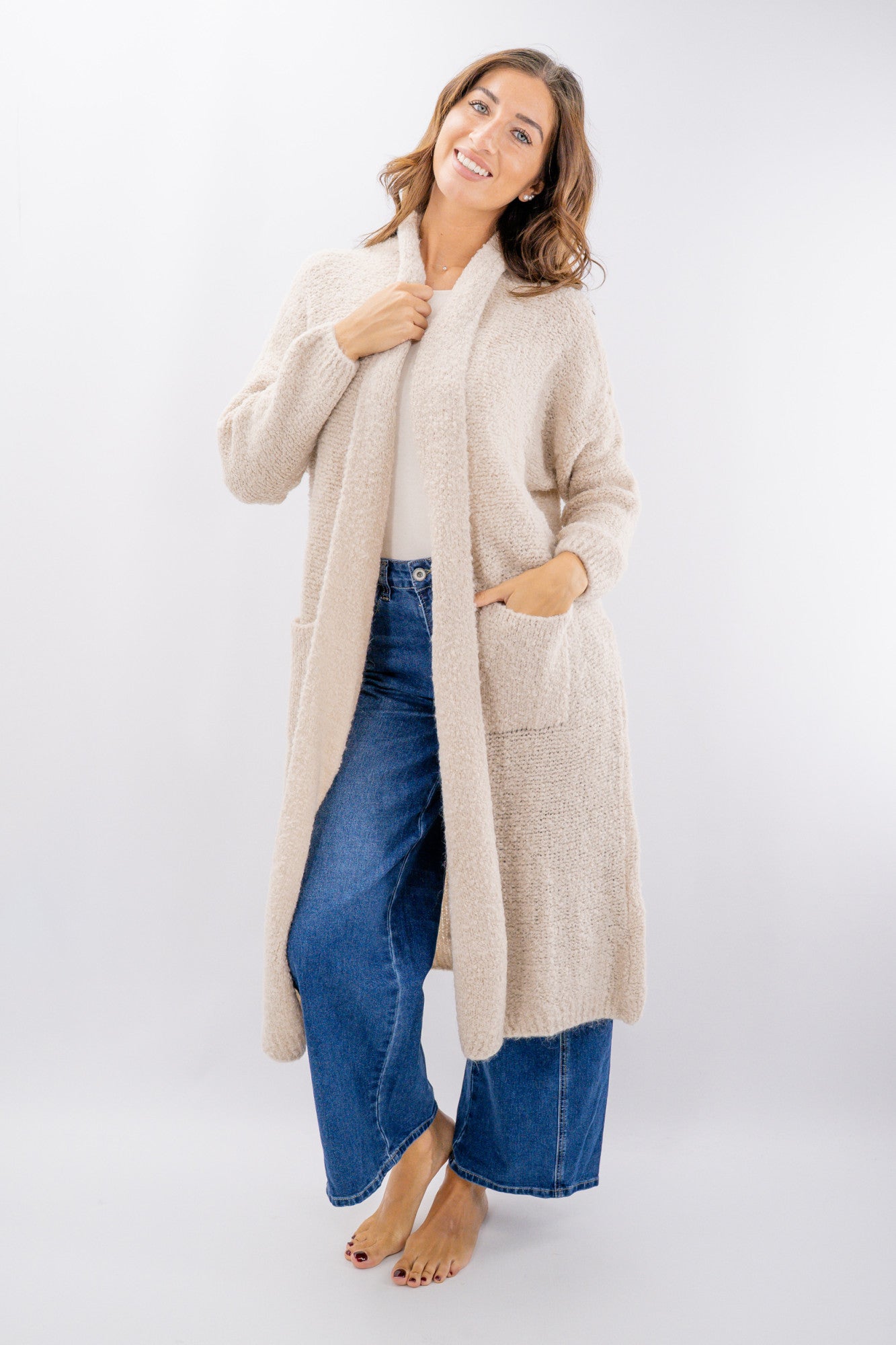 Cardigan lungo bouclé con tasche