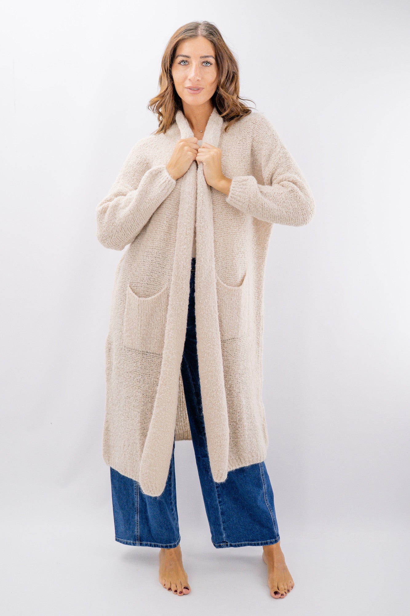 Cardigan lungo bouclé con tasche