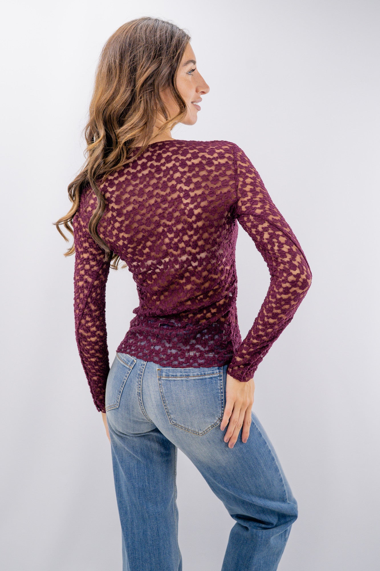 Maglia in pizzo a maniche lunghe