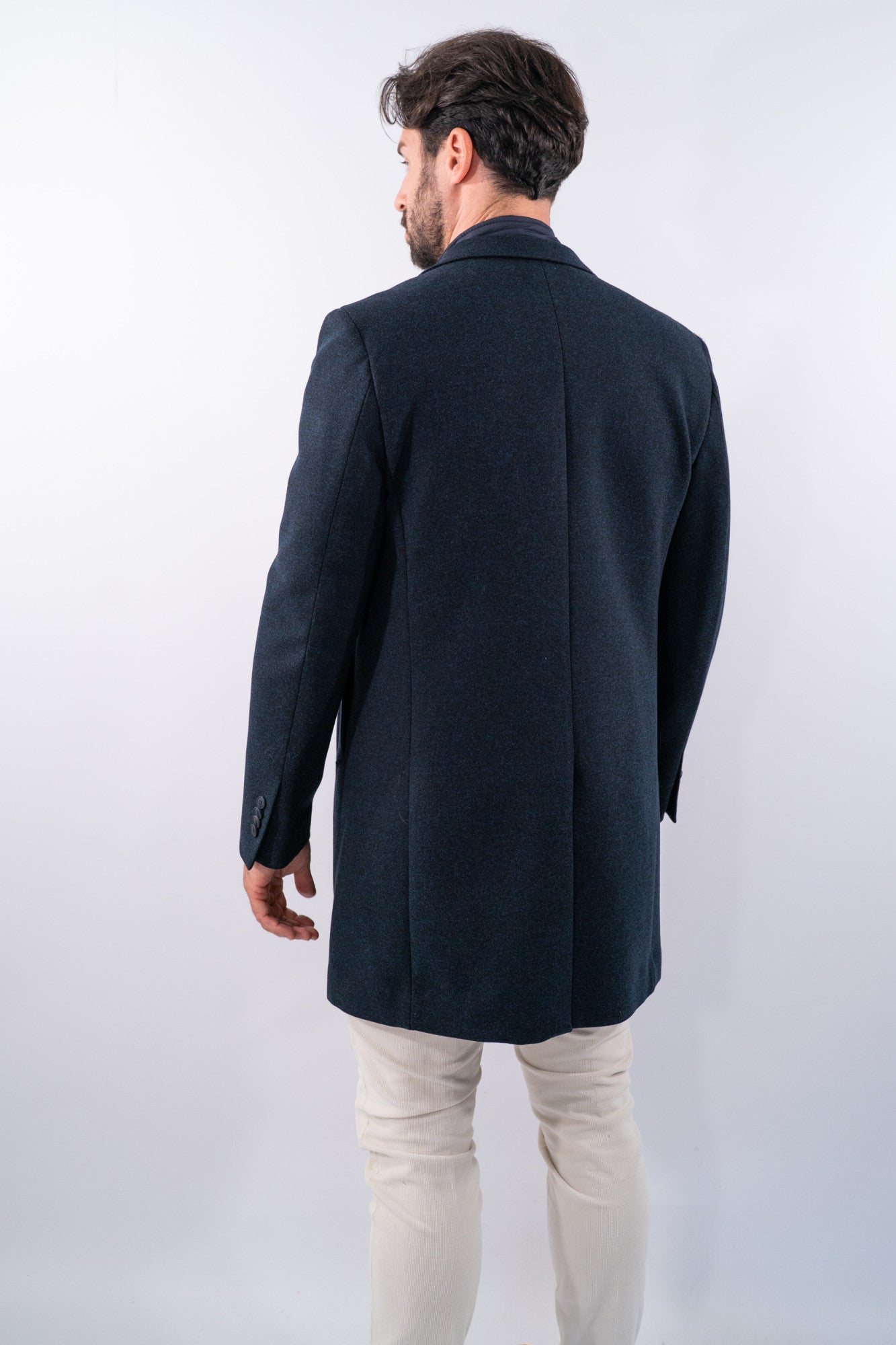 Cappotto monopetto corto con revers e pettorina trapuntata staccabile