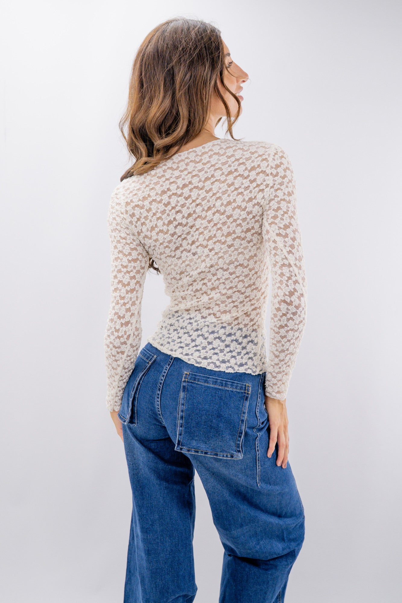 Maglia in pizzo a maniche lunghe