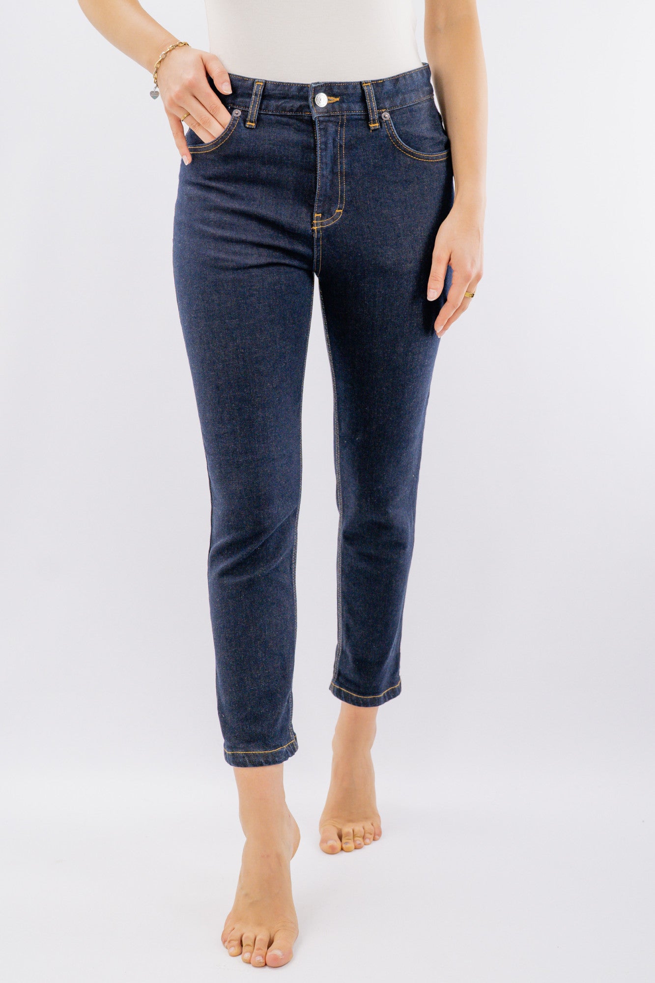 Jeans con x tasca posteriore