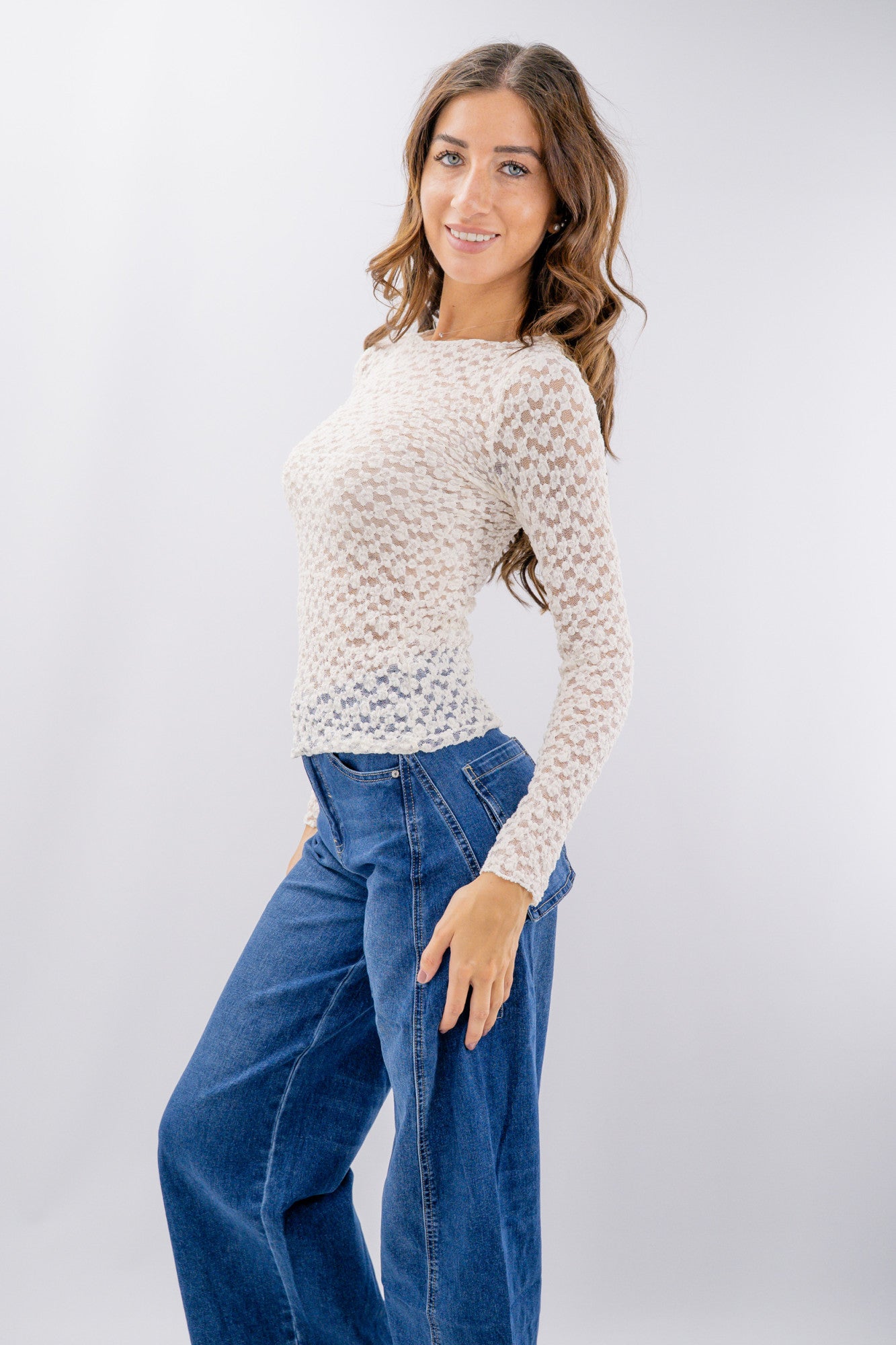 Maglia in pizzo a maniche lunghe