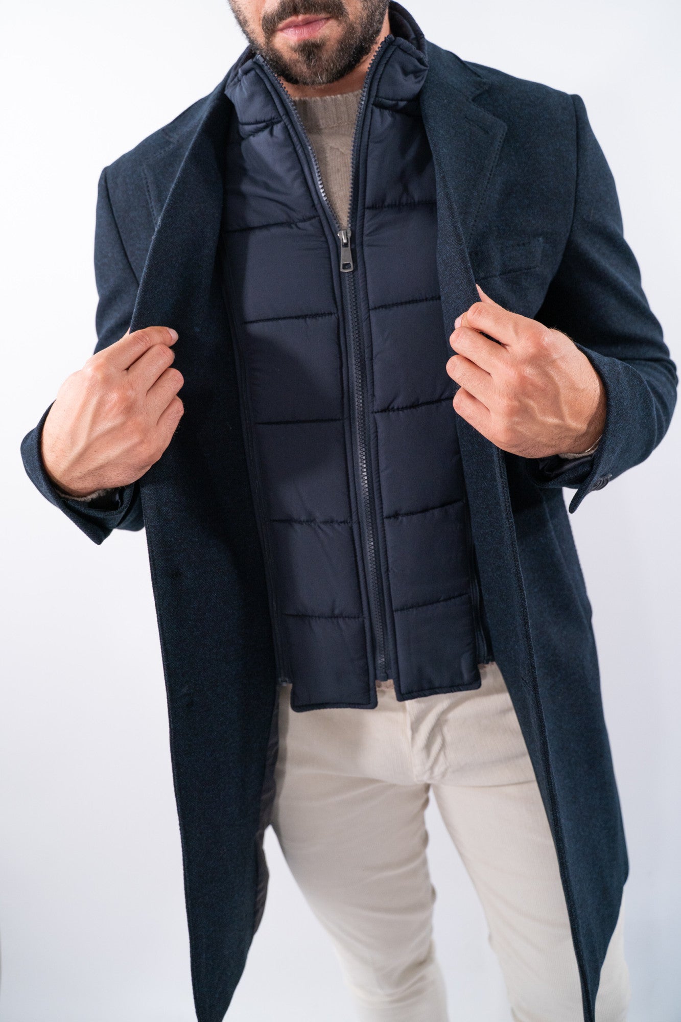 Cappotto monopetto corto con revers e pettorina trapuntata staccabile