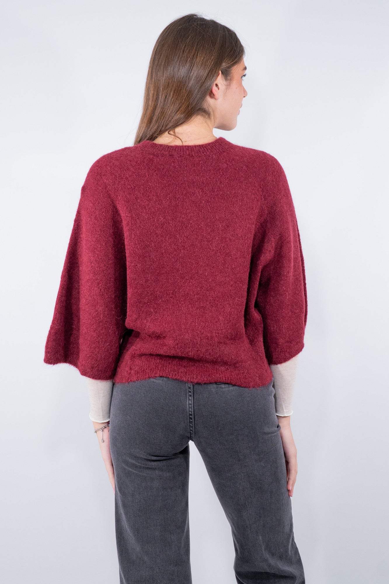 Maglia con linea a pipistrello manica al gomito