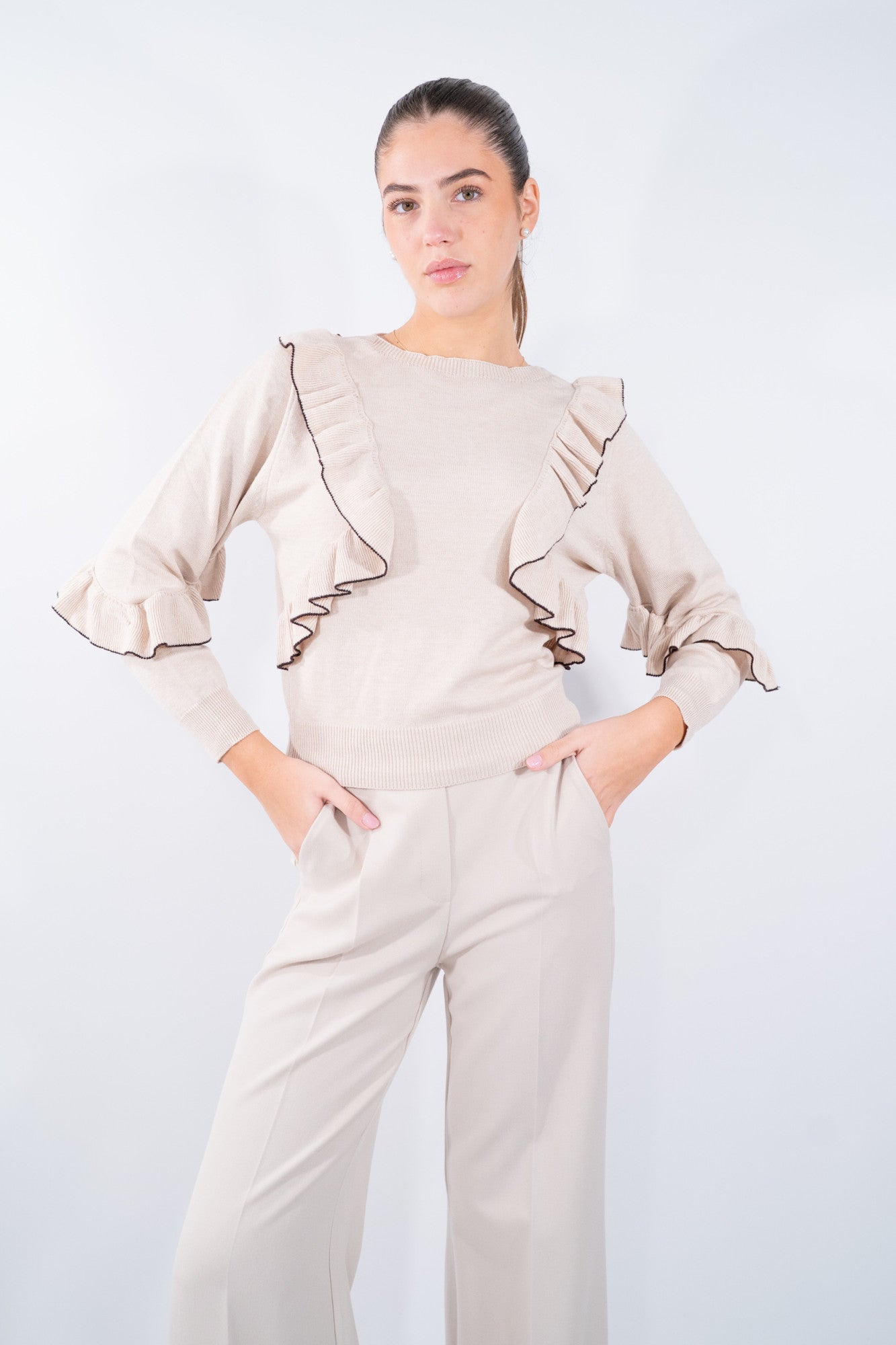 Maglia Gale con rouches diagonali e finiture ondulate