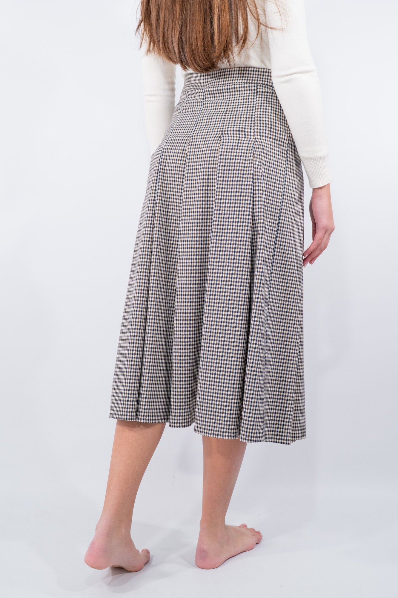 Gonna lunga a pieghe pied de poule