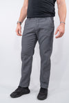 Pantalone slim fit con bottoni colorati
