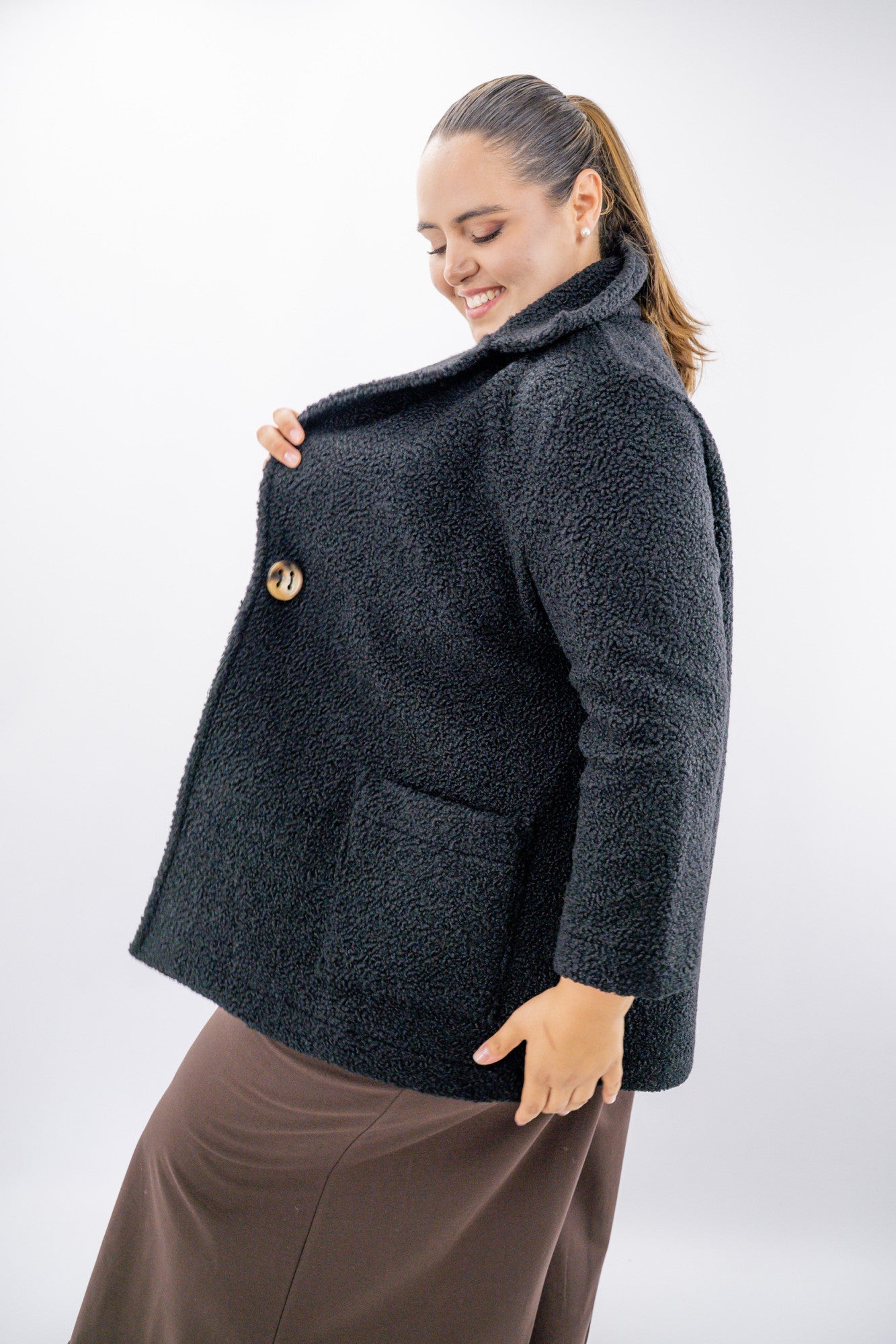 Giaccone teddy over con maxi tasche