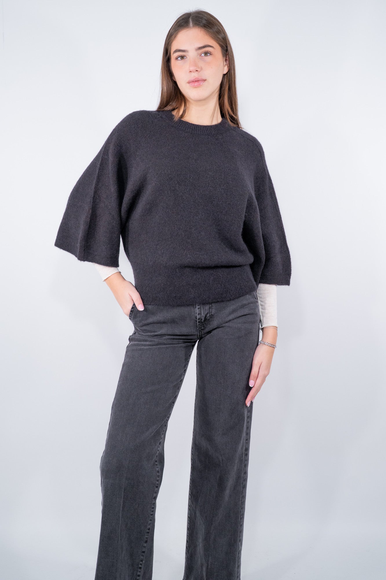 Maglia con linea a pipistrello manica al gomito