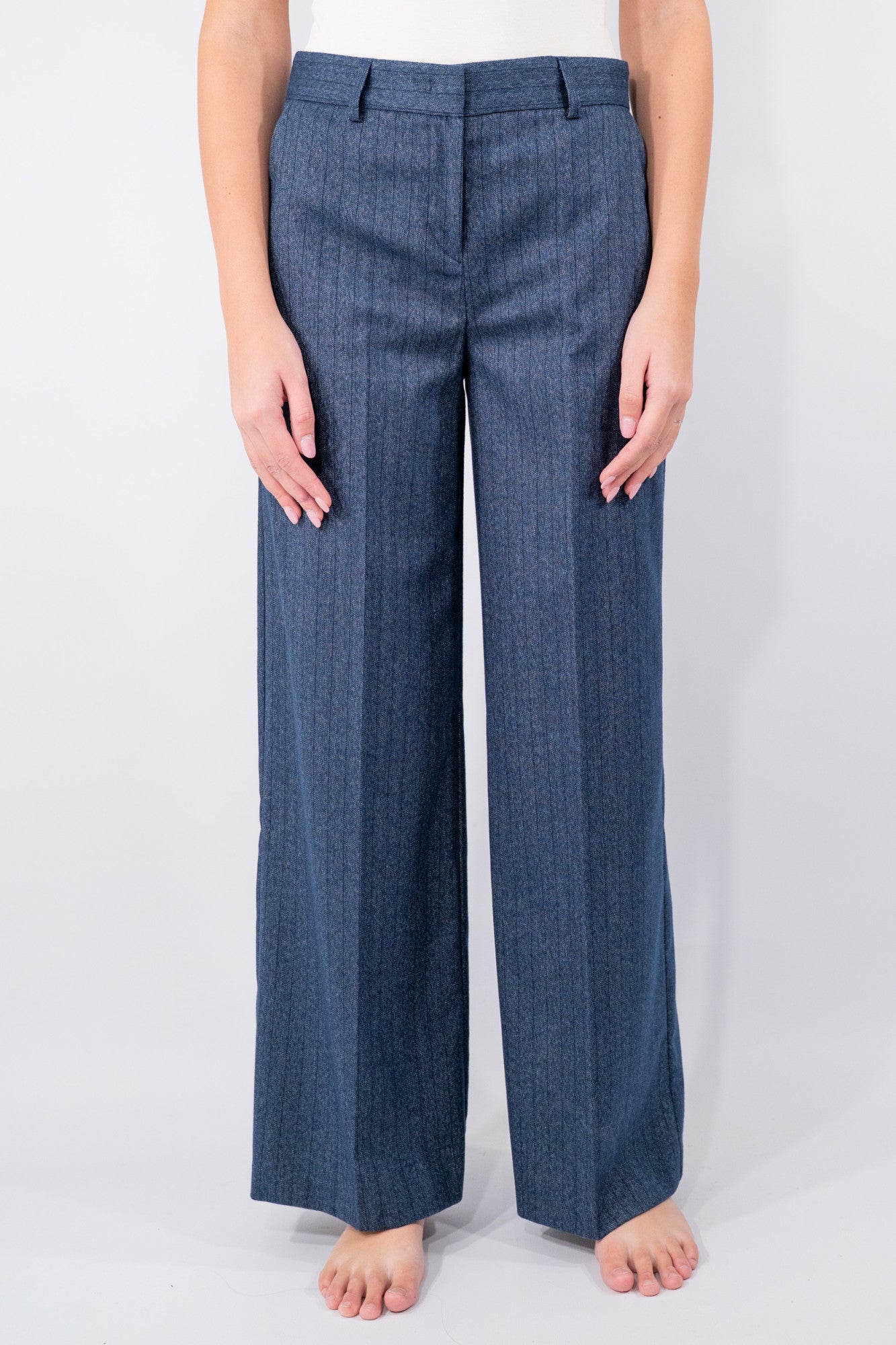 Pantalone palazzo in tessuto spinato gessato