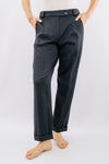 Pantalone con risvolto sul fondo