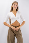 Maglia con ampio scollo a V