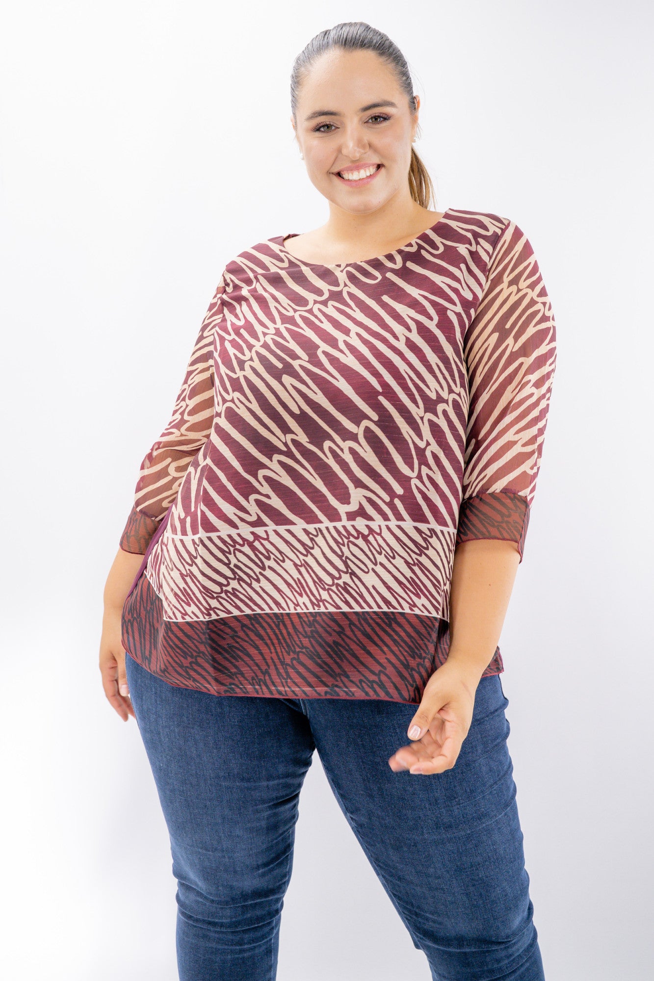 Blusa oversize con fantasia astratta