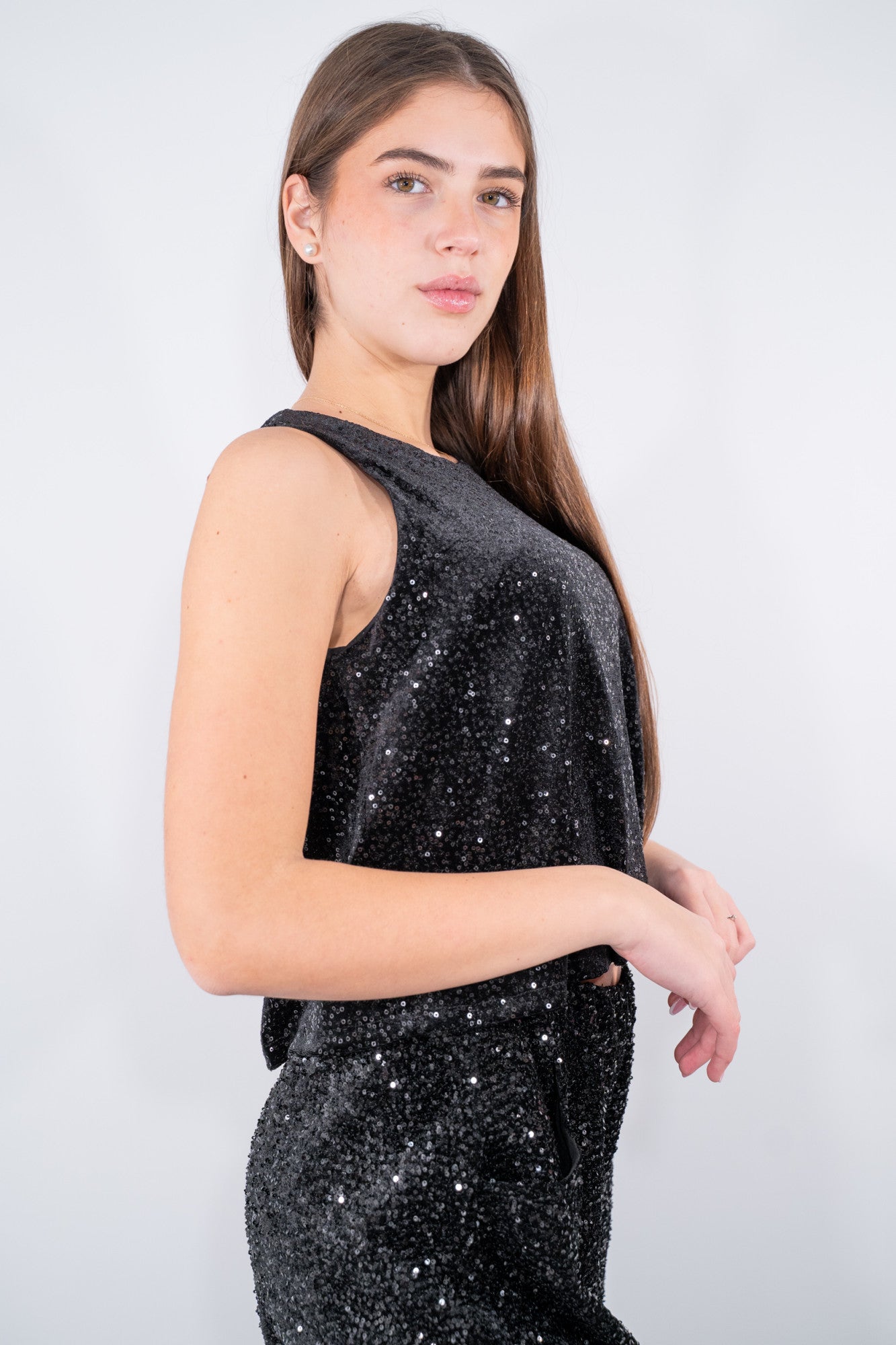 Top smanicato con paillettes