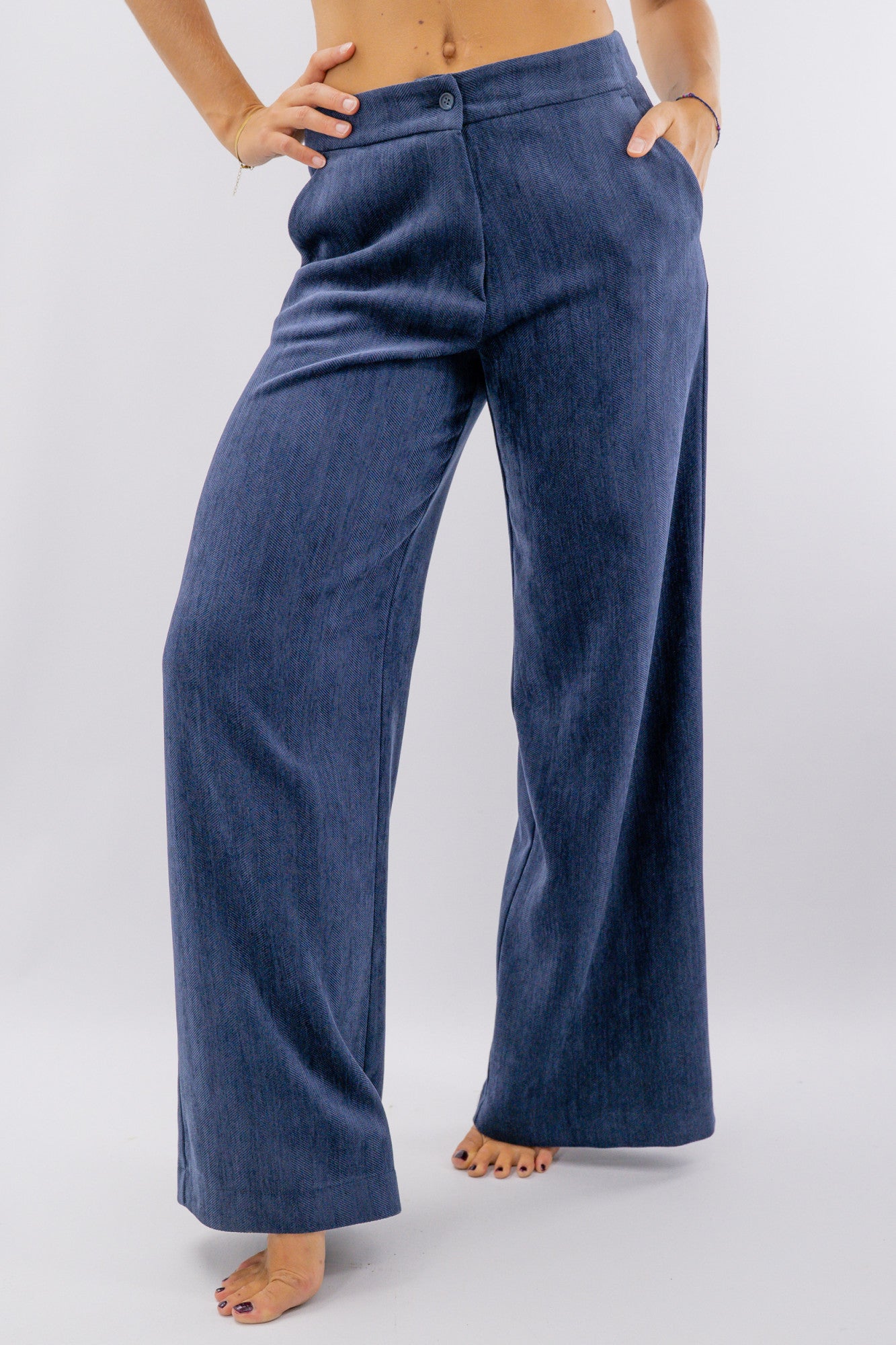 Pantalone palazzo effetto spinato
