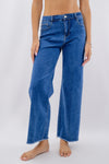 Jeans palazzo cropped con orlo sfrangiato