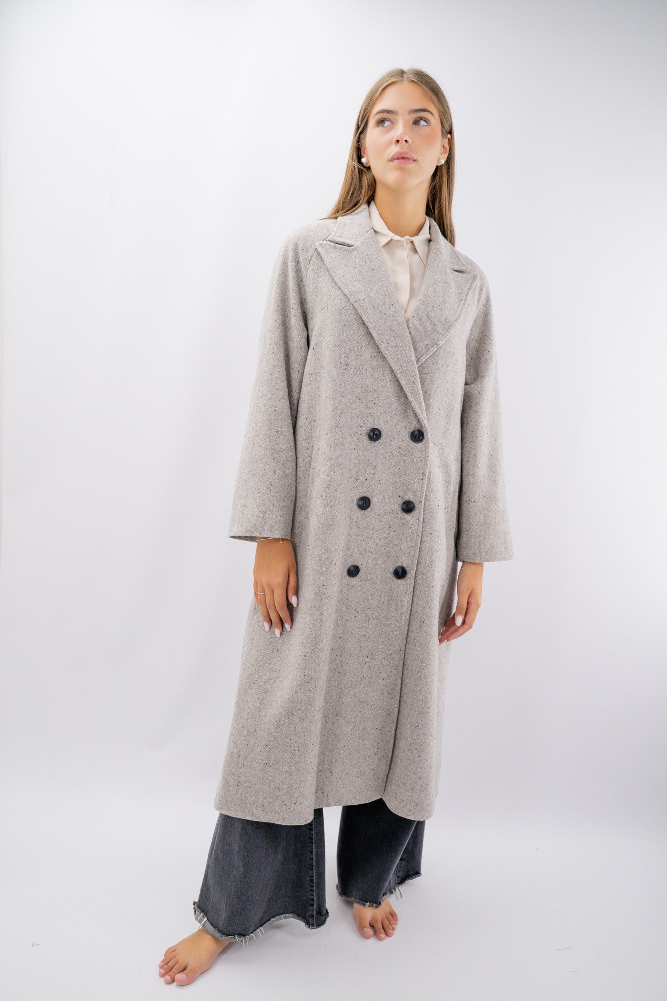 Cappotto oversize foderato in texture ad effetto melange.