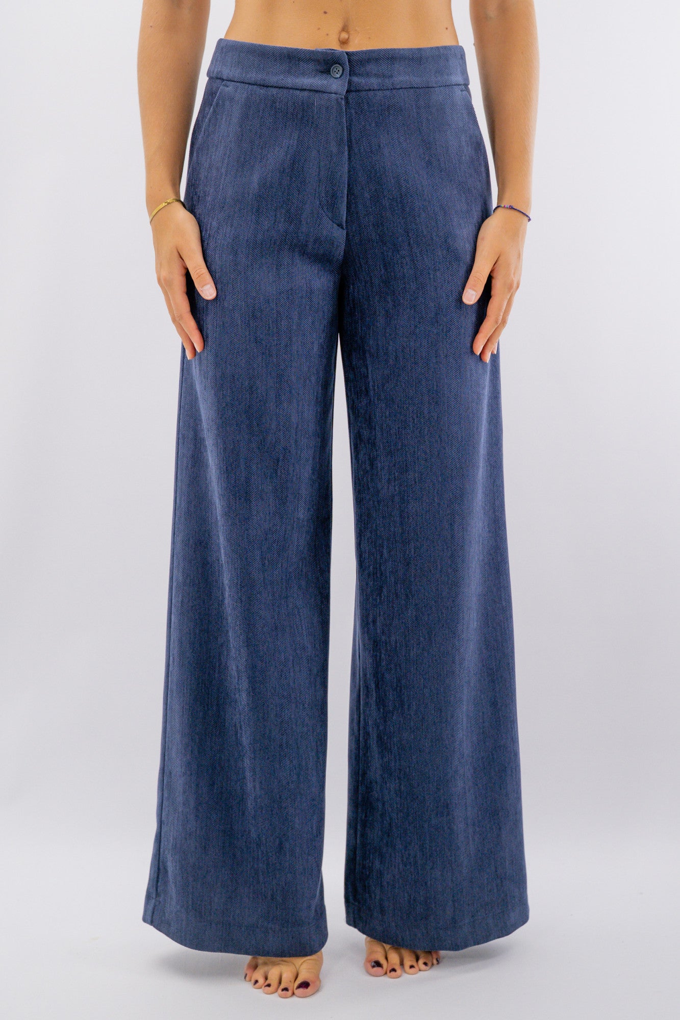 Pantalone palazzo effetto spinato