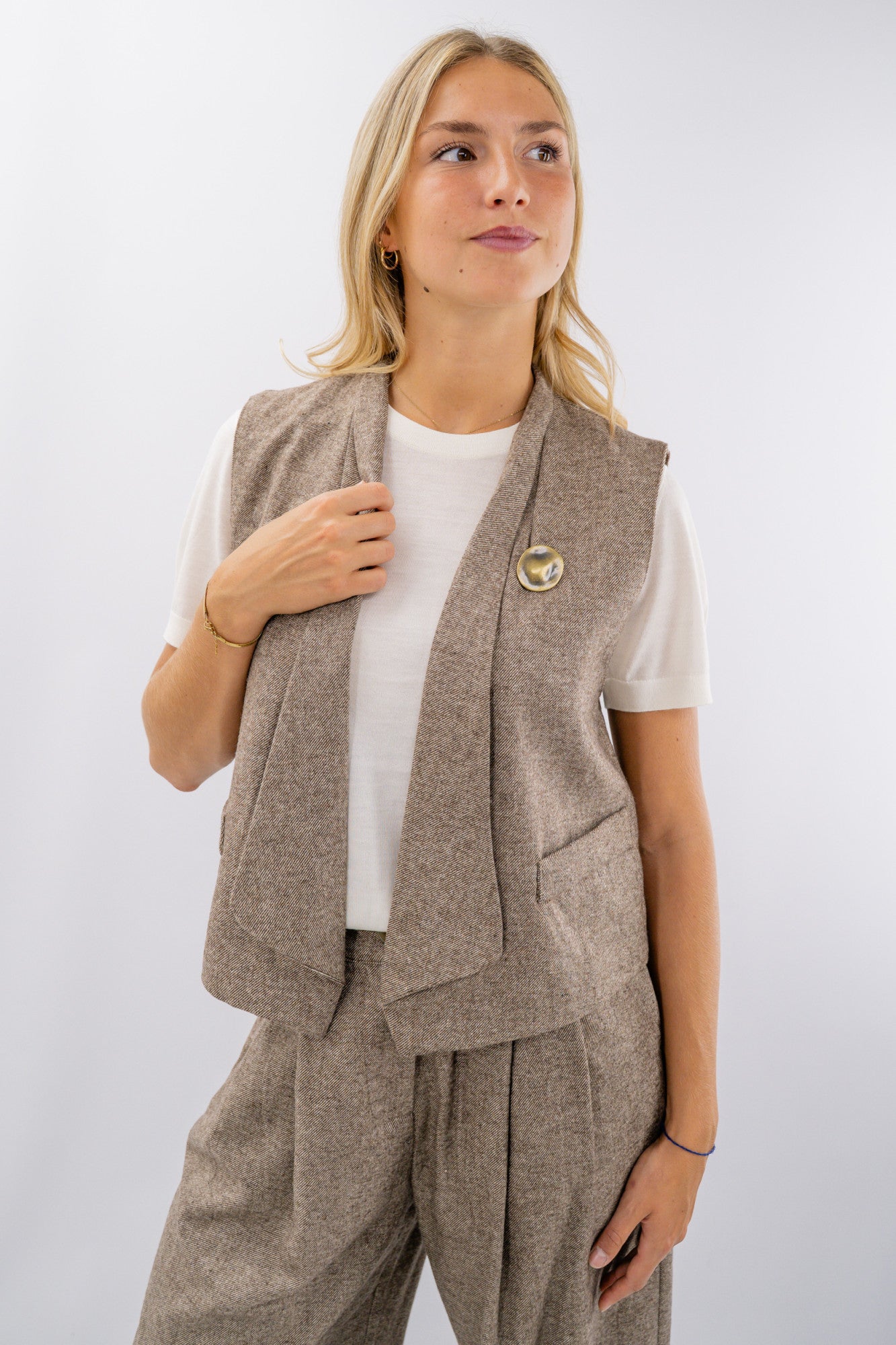 Gilet tweed aperto con revers