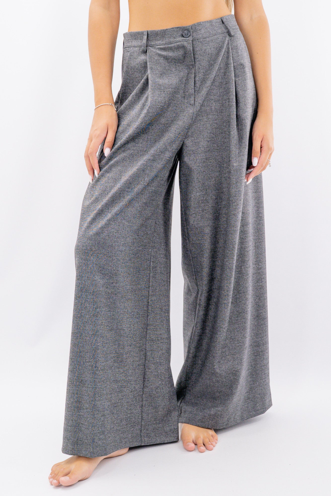 Pantalone palazzo in texture operata con pinces