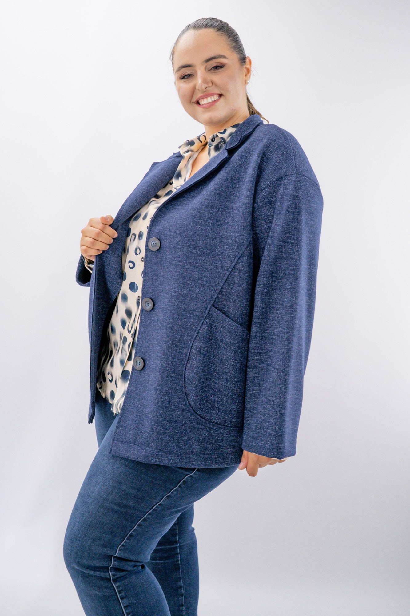 Cappottino a microtrama con maxi tasche e rever