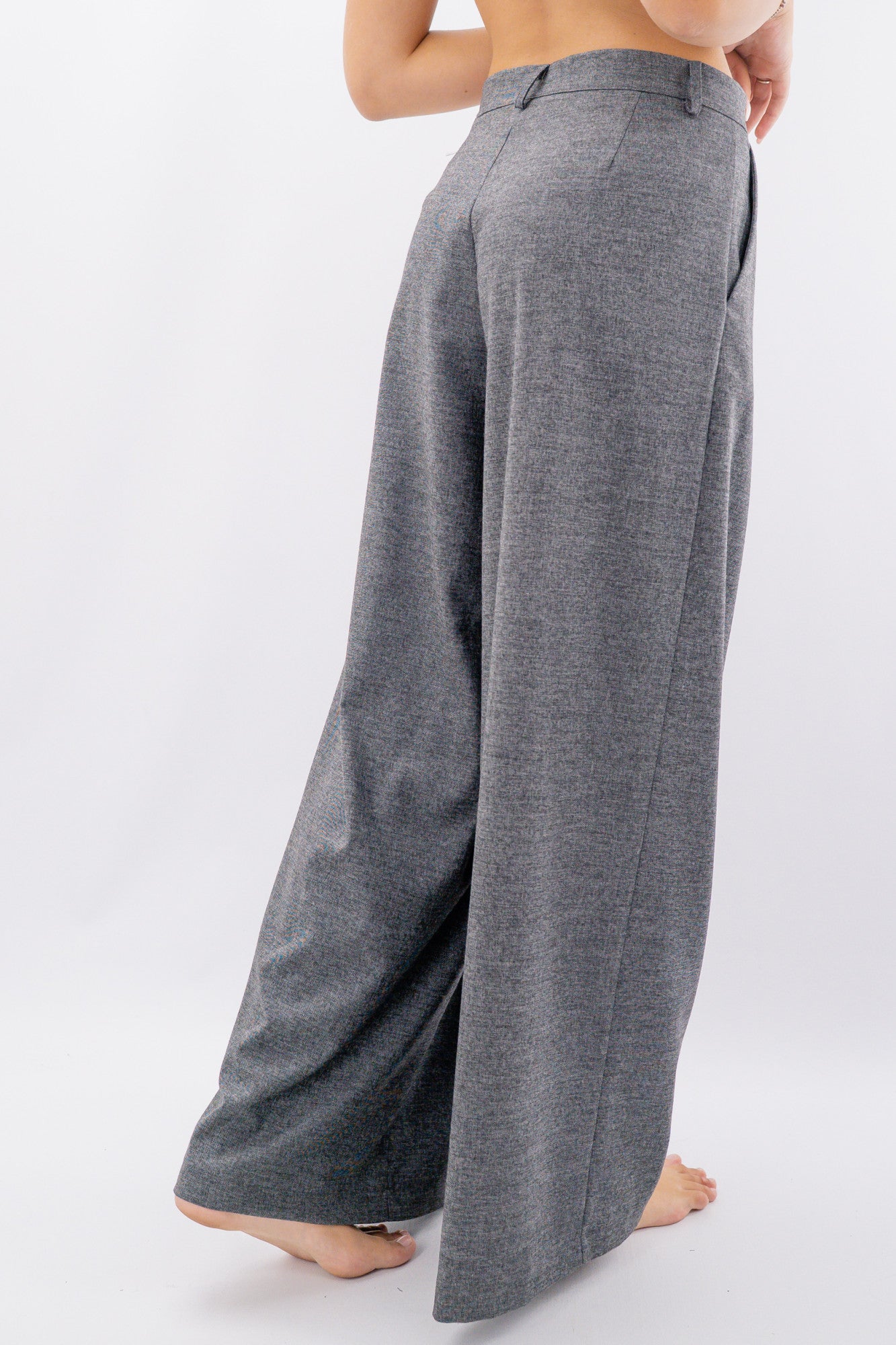 Pantalone palazzo in texture operata con pinces