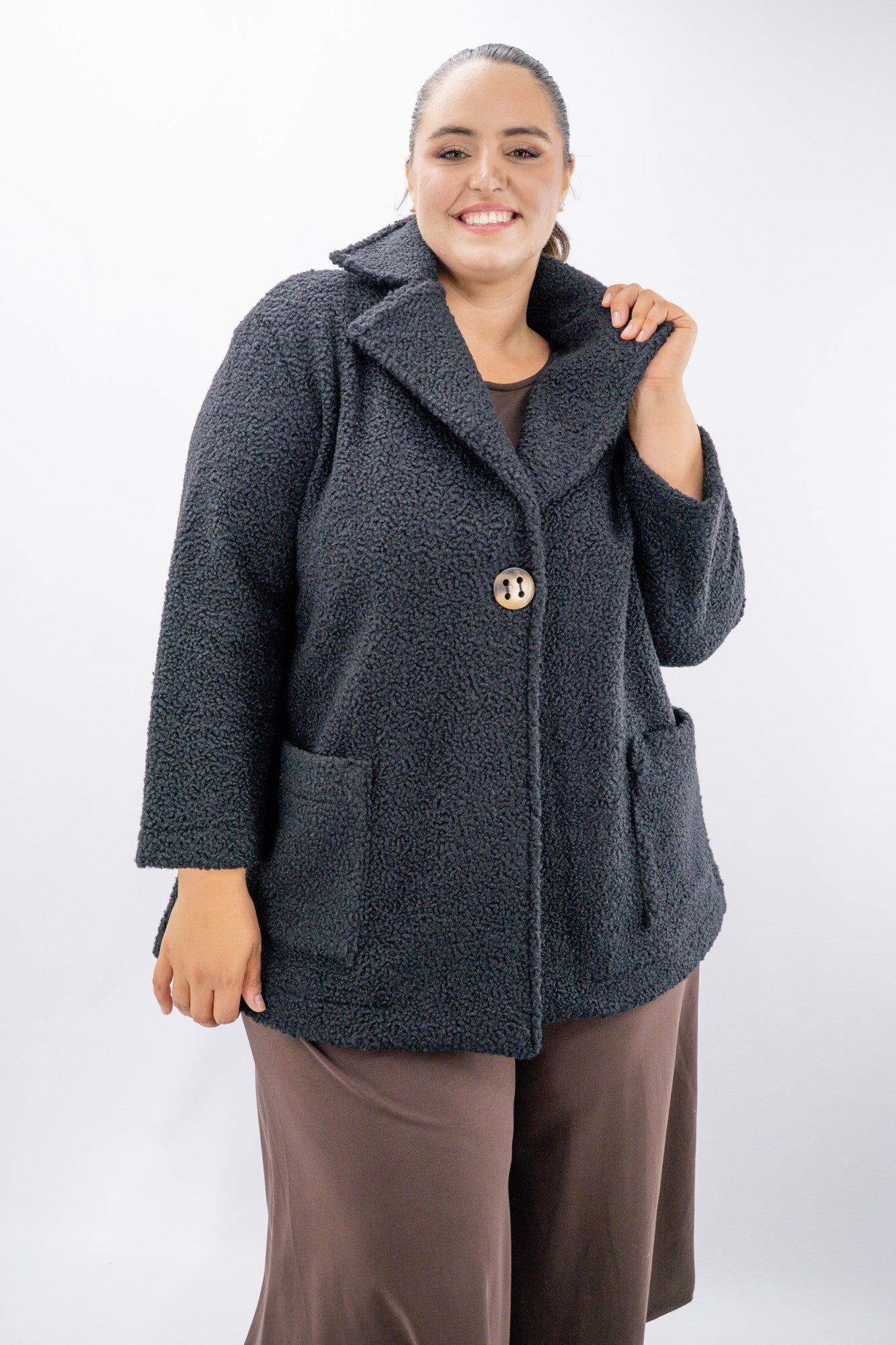 Giaccone teddy over con maxi tasche