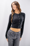 Golfino cropped con bottoni gioiello