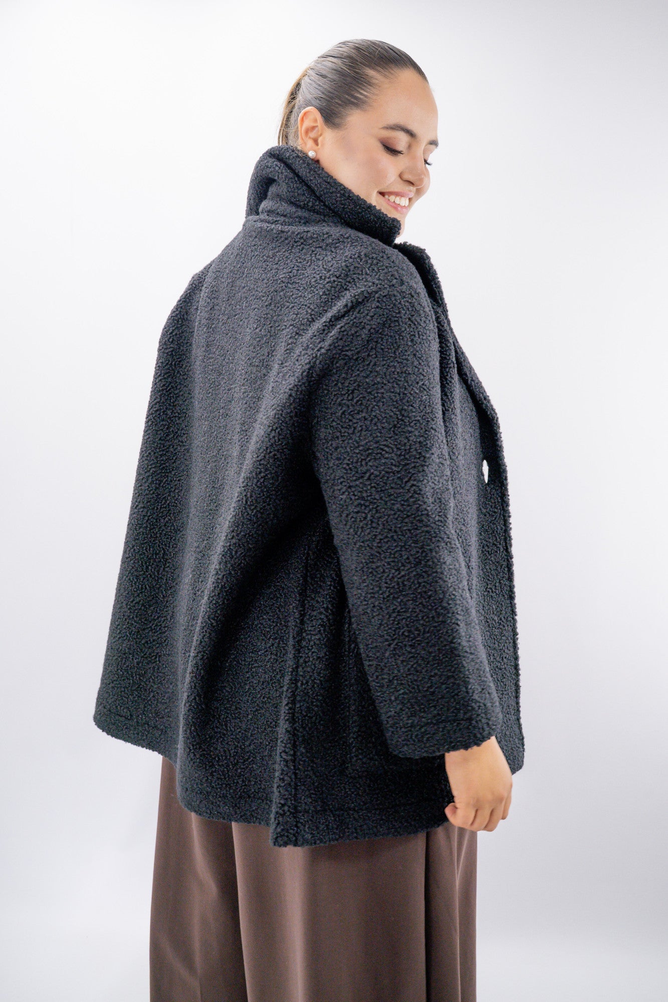 Giaccone teddy over con maxi tasche