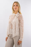 Blusa in pizzo con collo ad allaccio