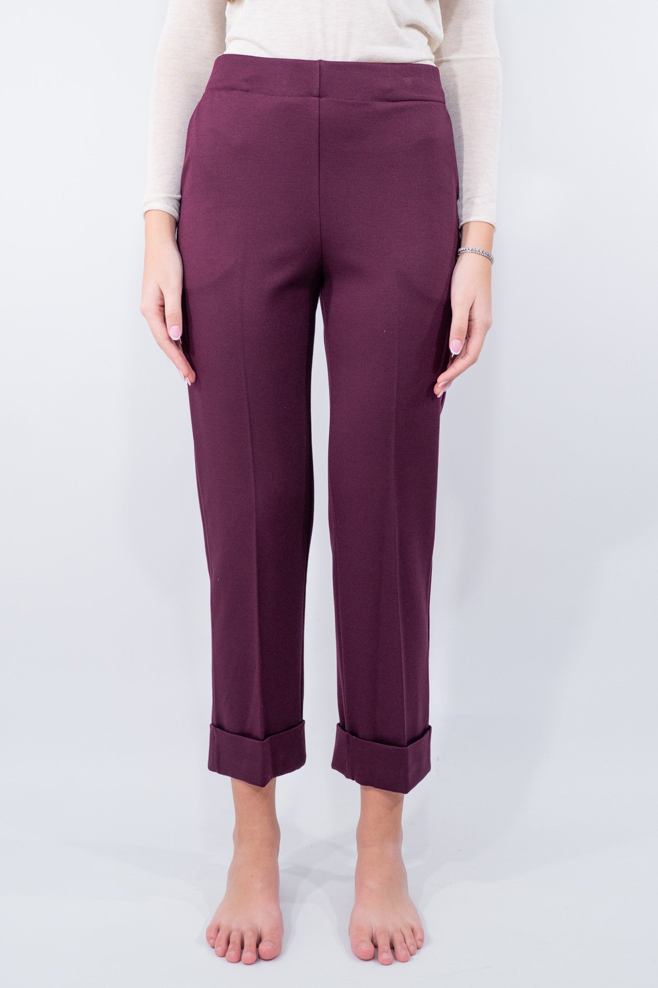 Pantalone con risvolto in punto Milano obliquo.