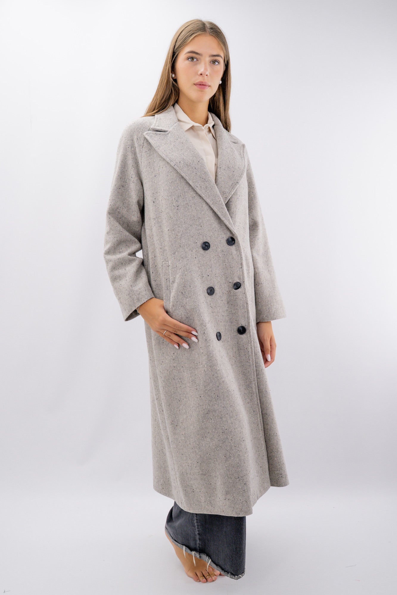 Cappotto oversize foderato in texture ad effetto melange.