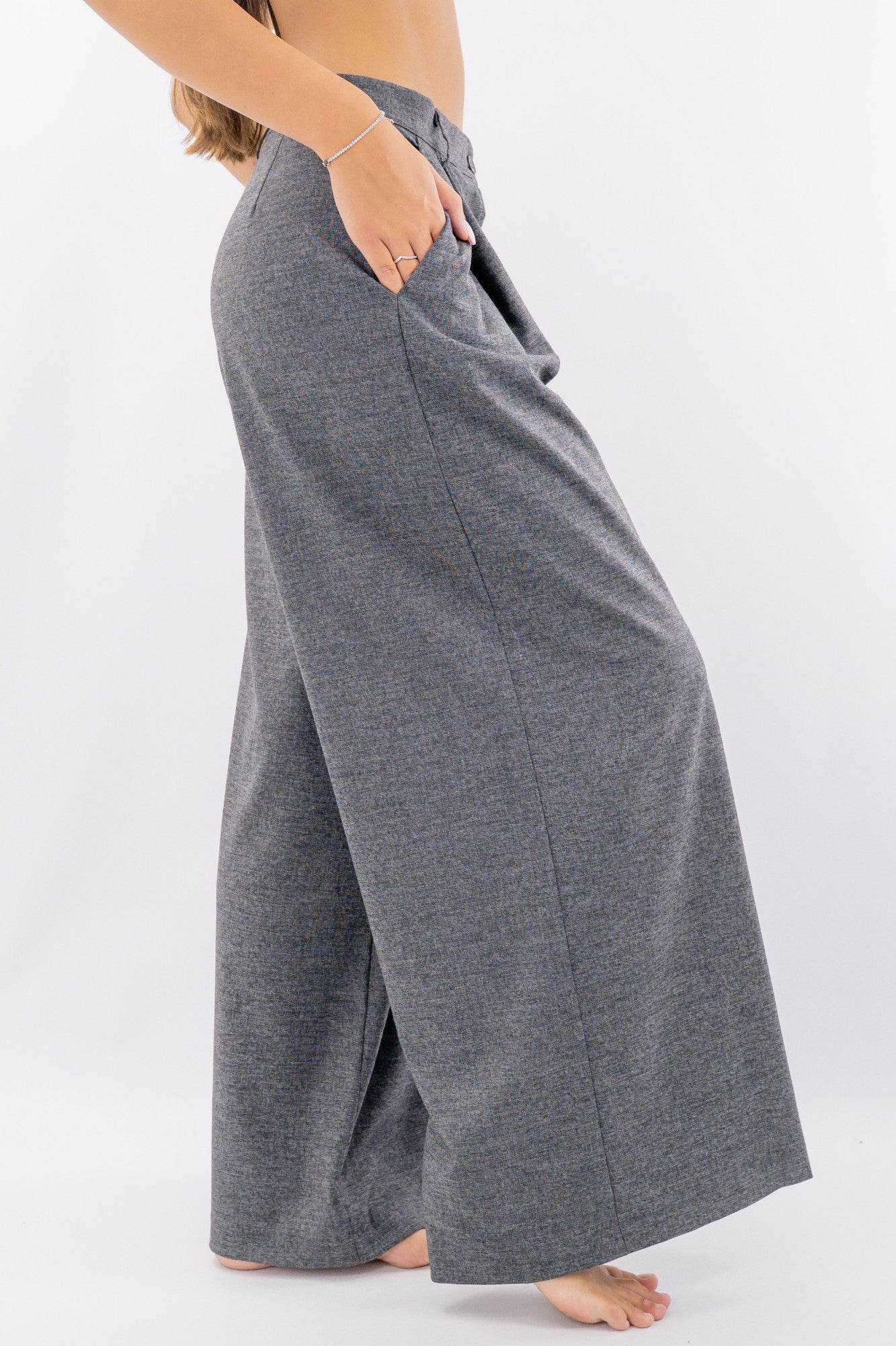Pantalone palazzo in texture operata con pinces