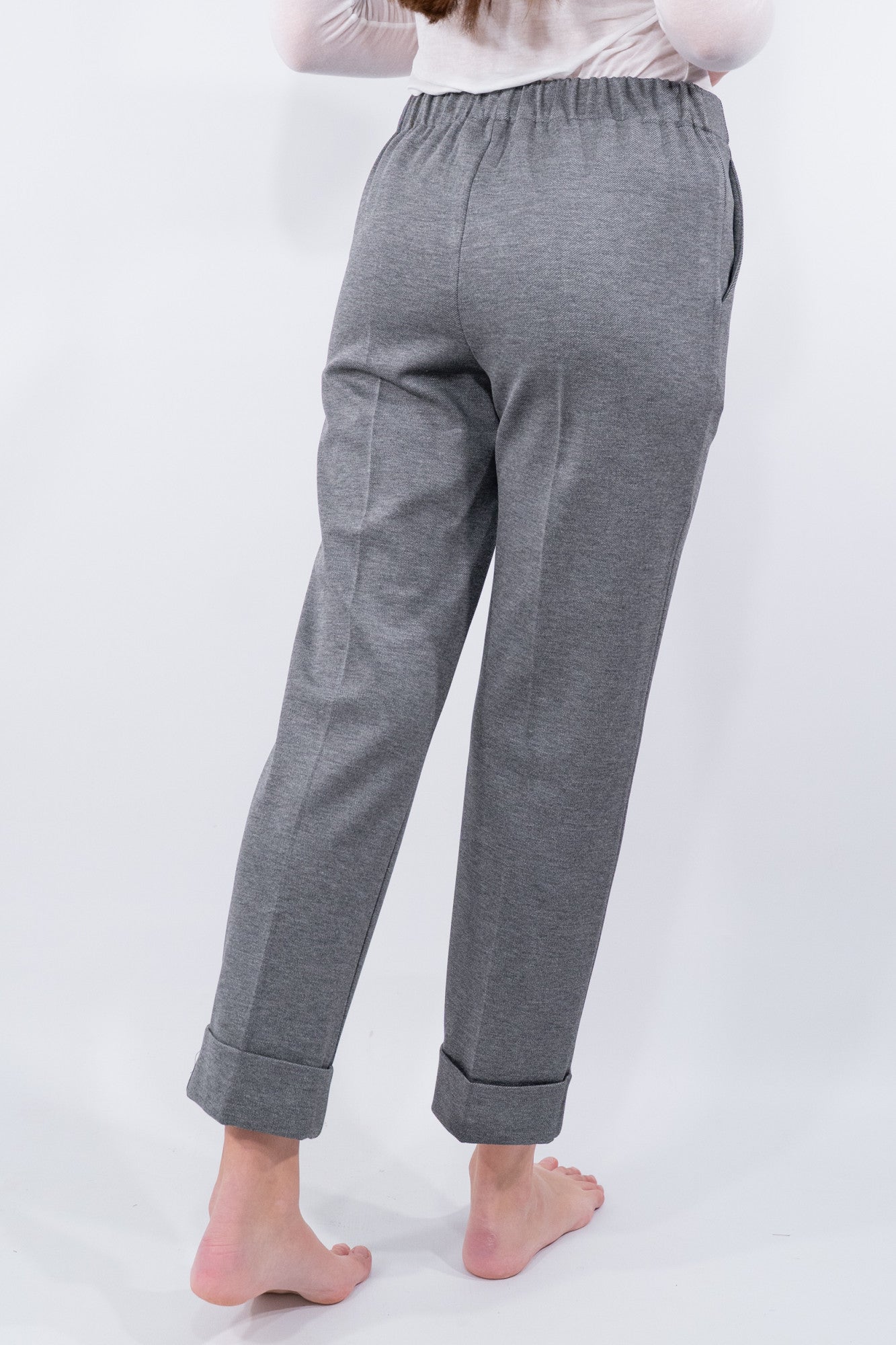 Pantalone con risvolto in punto Milano obliquo.