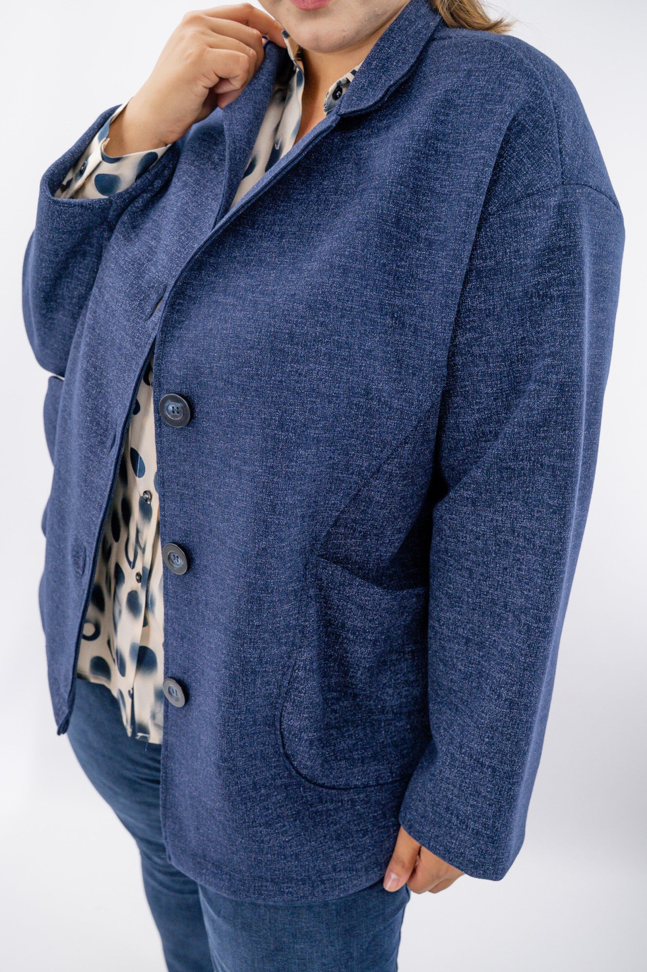 Cappottino a microtrama con maxi tasche e rever