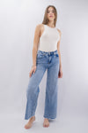Jeans palazzo a gamba larga con fondo sfrangiato