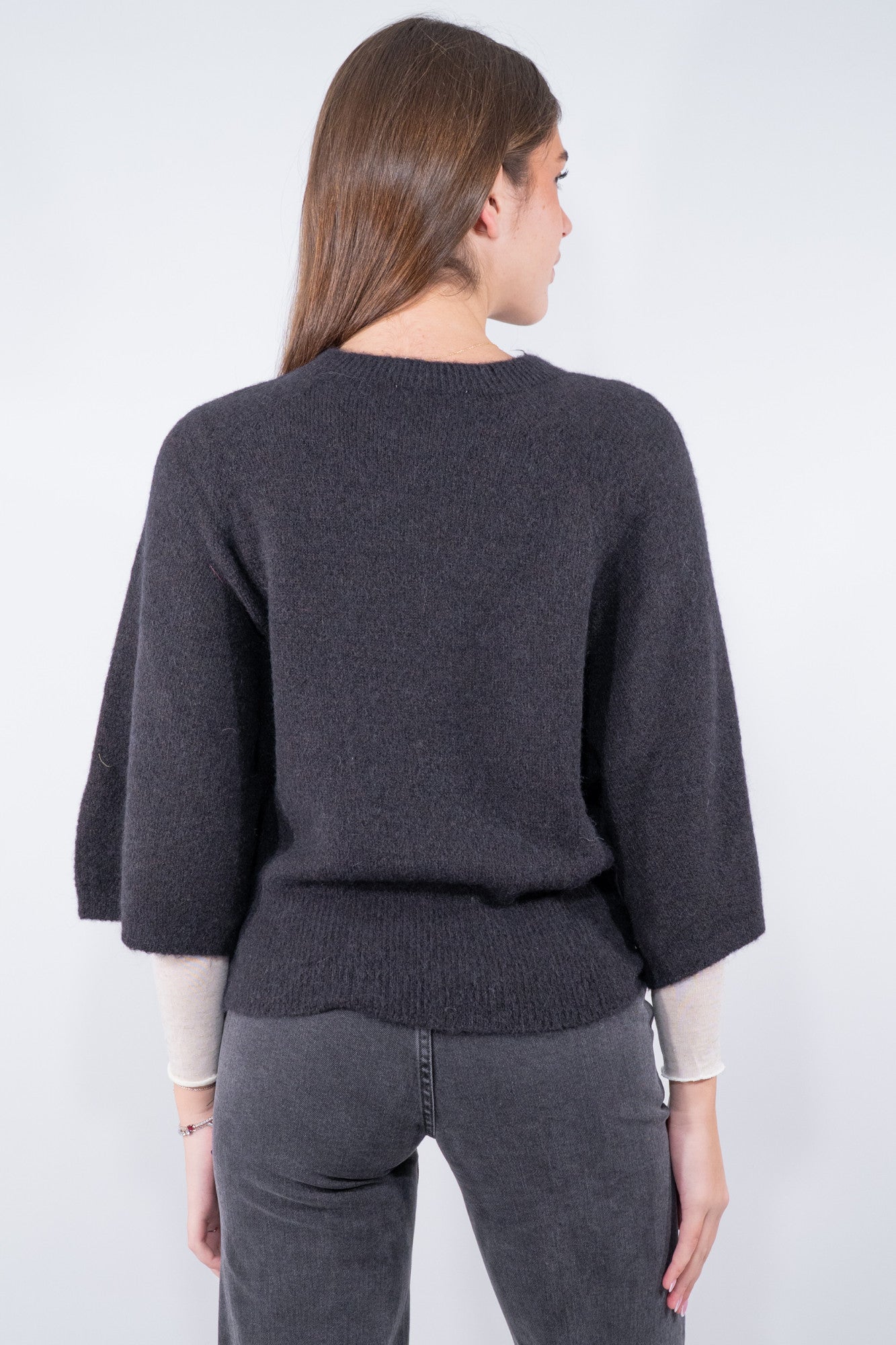 Maglia con linea a pipistrello manica al gomito