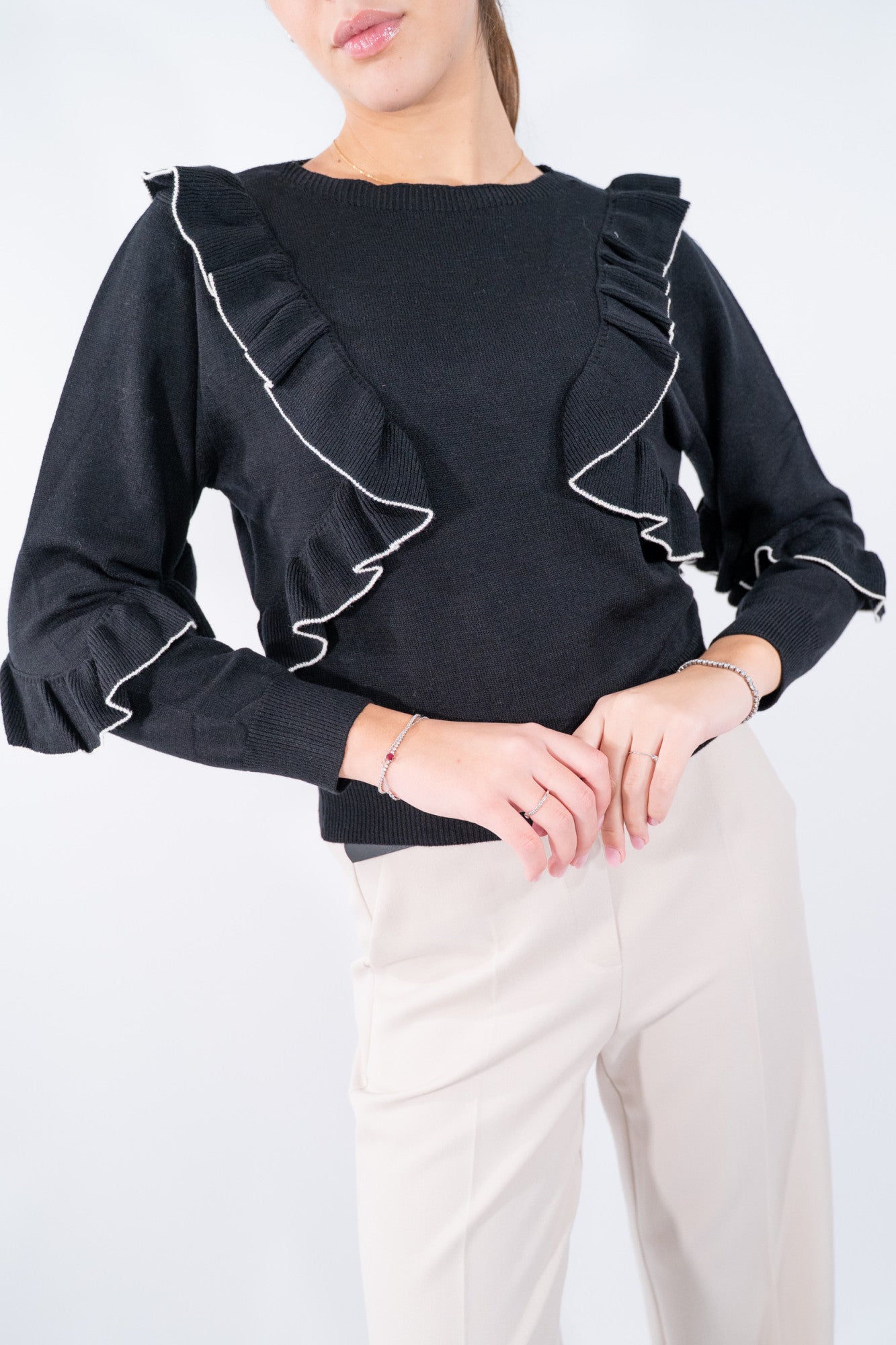 Maglia Gale con rouches diagonali e finiture ondulate