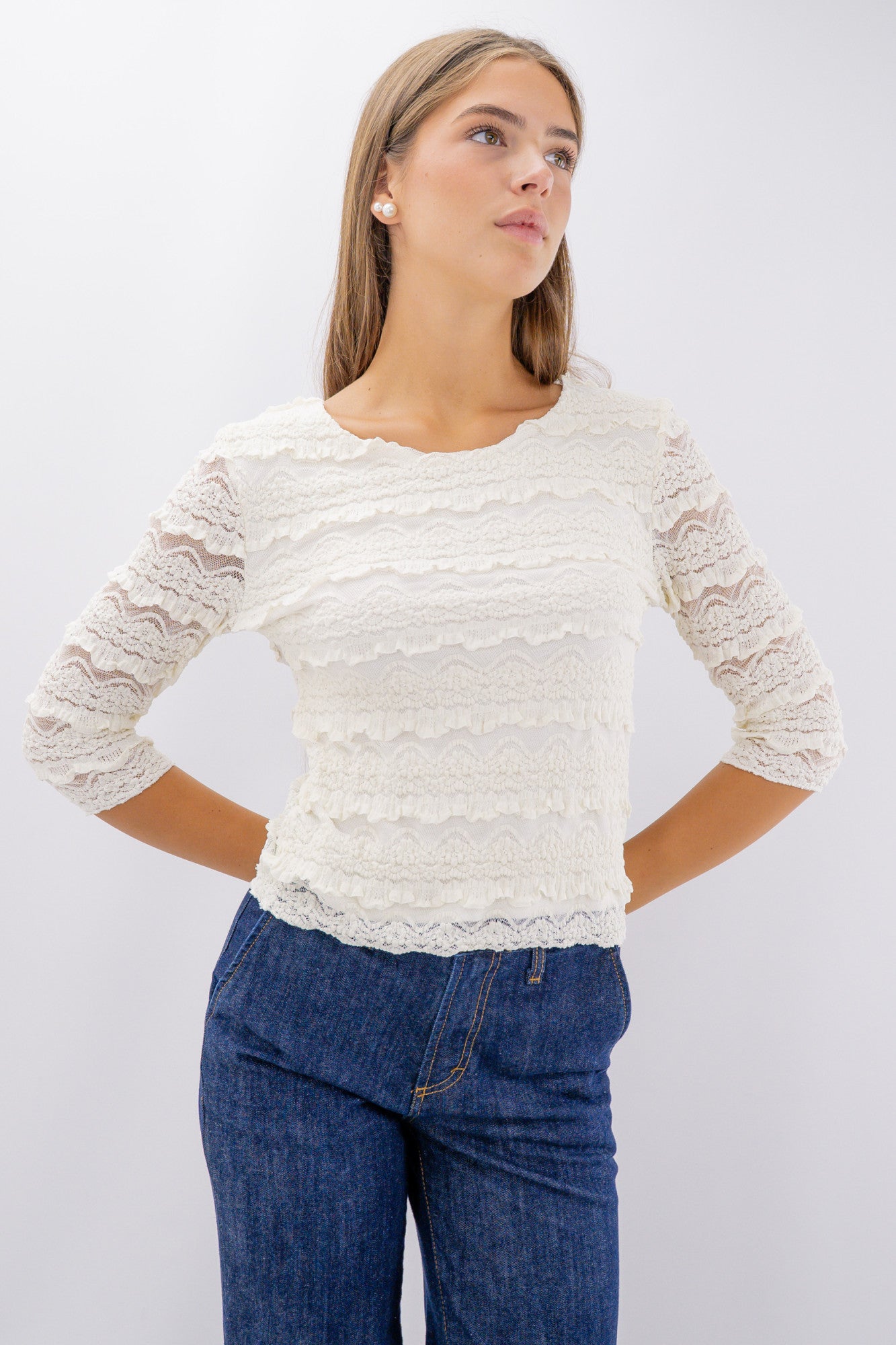 Maglia in pizzo elasticizzato goffrato