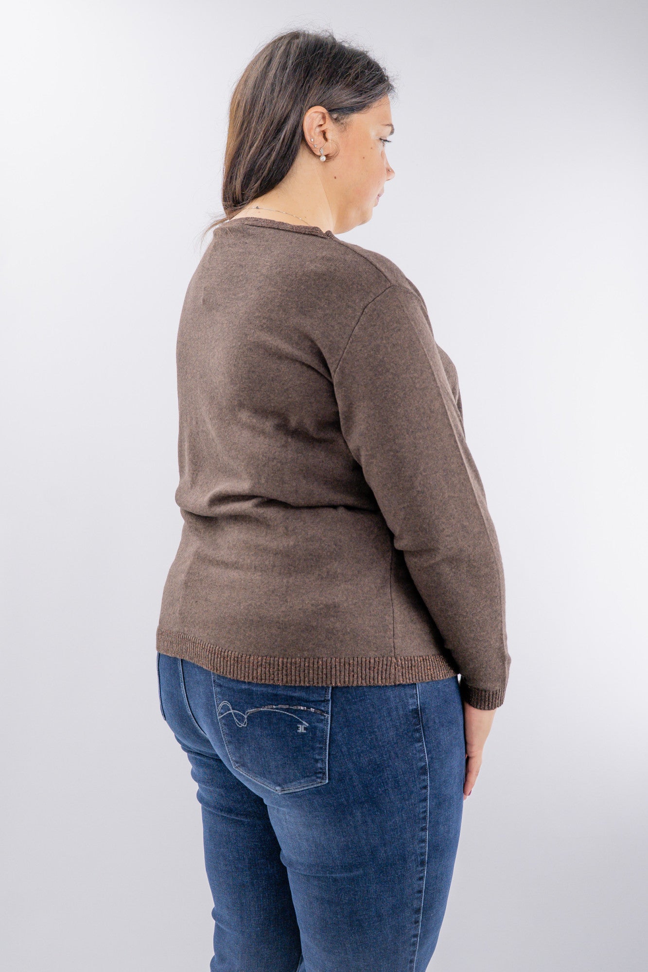 Maglia over con tasca e profili luminosi