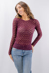 Maglia in pizzo a maniche lunghe