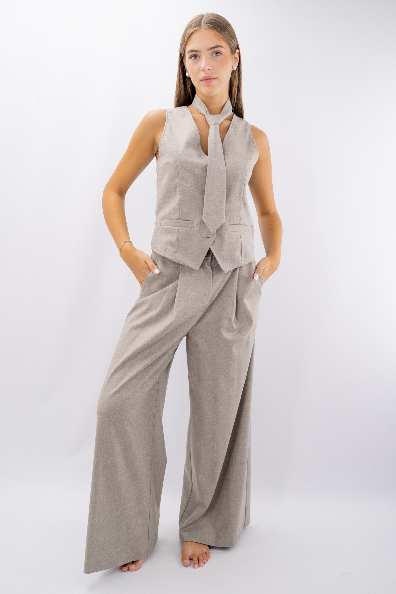 Pantalone palazzo in texture operata con pinces