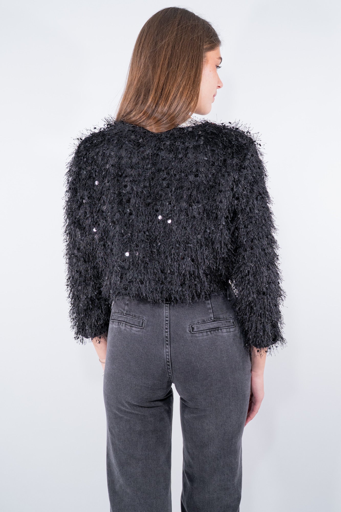 Giacchino coprispalle con  frange e paillettes