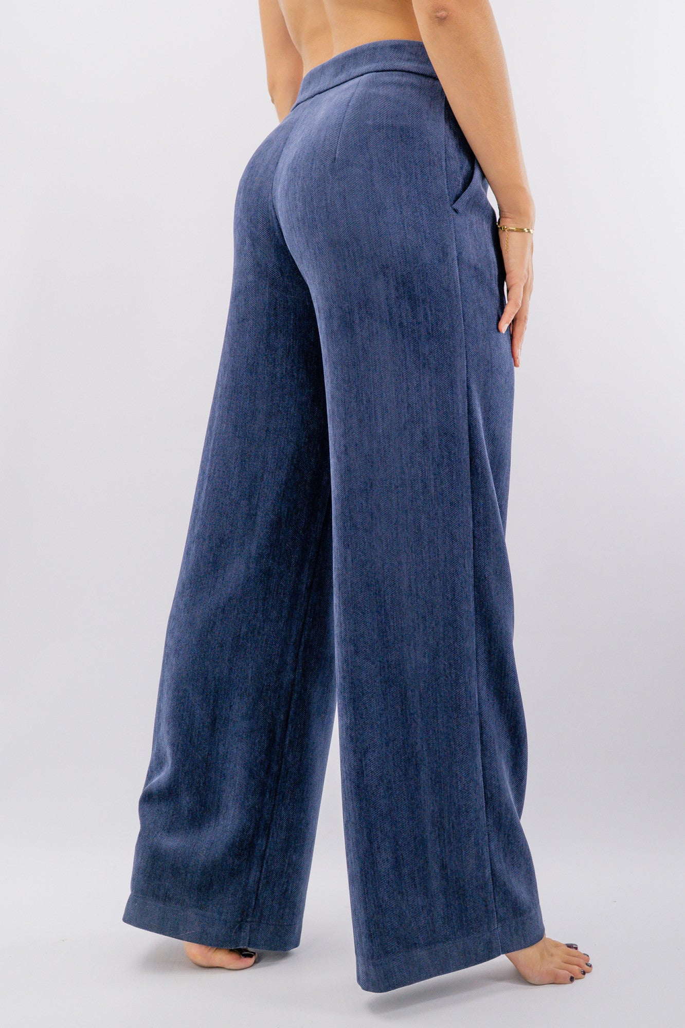 Pantalone palazzo effetto spinato