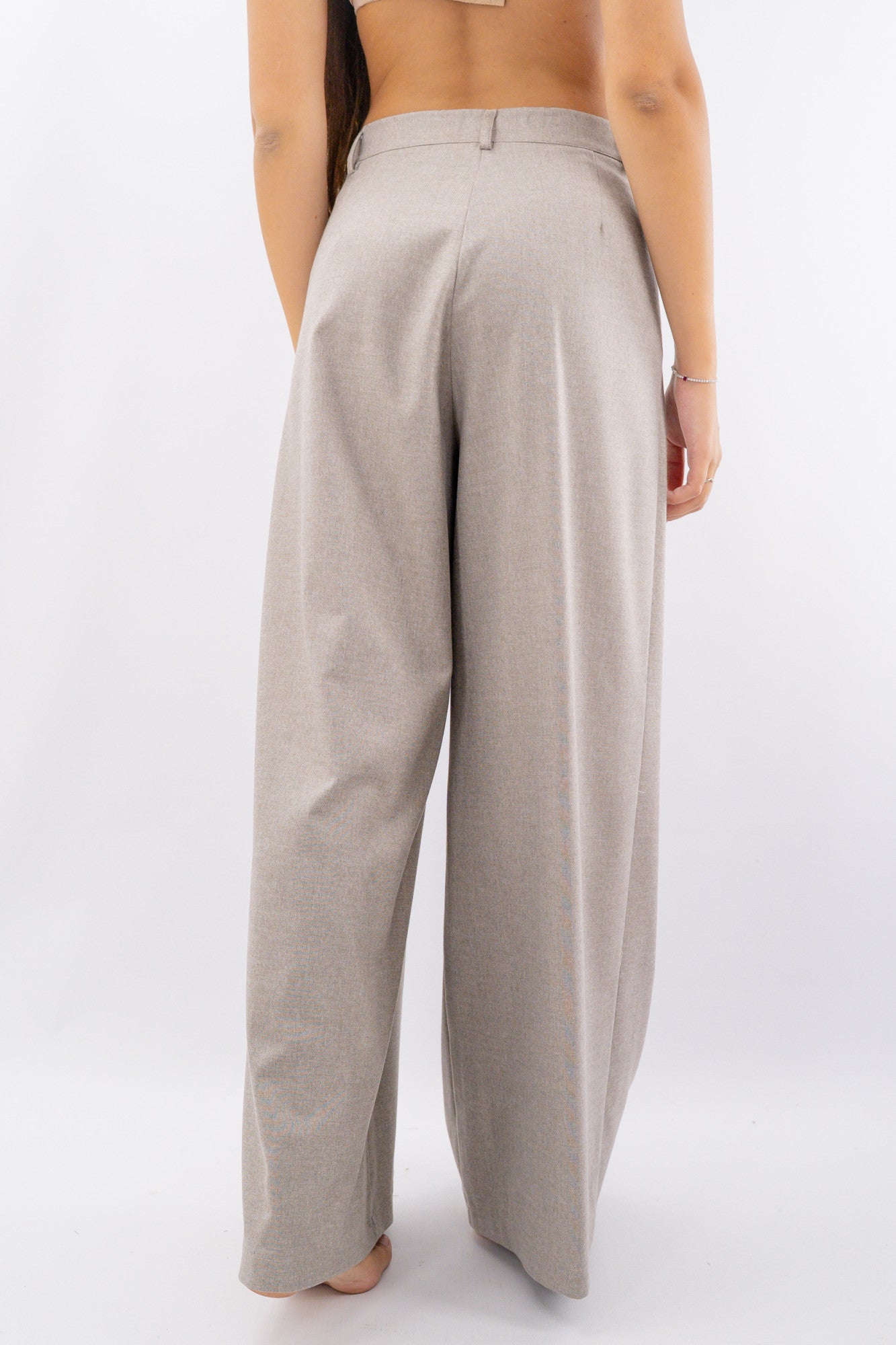 Pantalone palazzo in texture operata con pinces