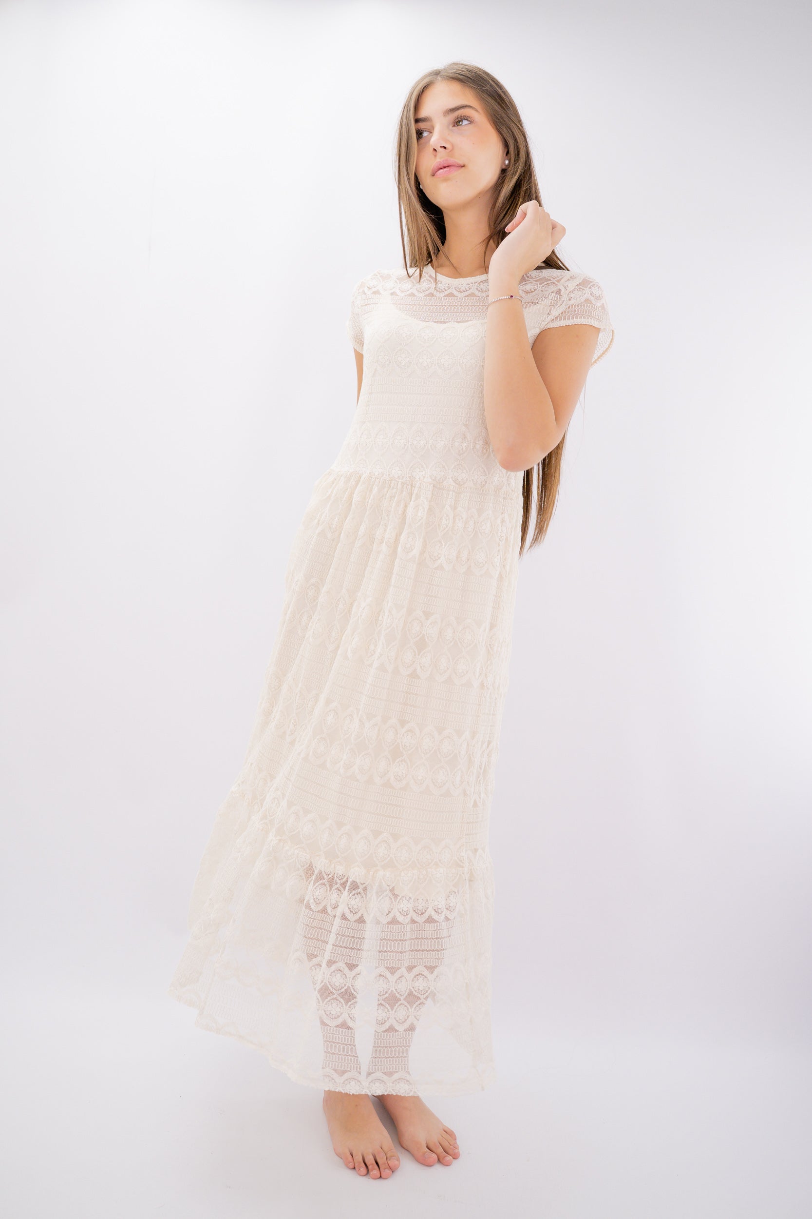 Abito lungo in pizzo con sottoveste